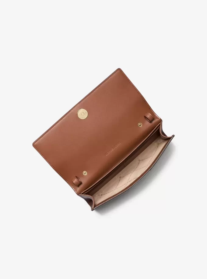 Carson Große, wandelbare Umhängetasche mit charakteristischem Logo