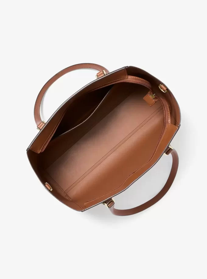 Charlotte Große 3-in-1 Tragetasche mit charakteristischem Logo