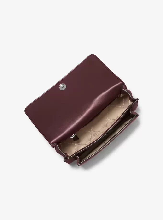 Claire Große Wildleder-Schultertasche