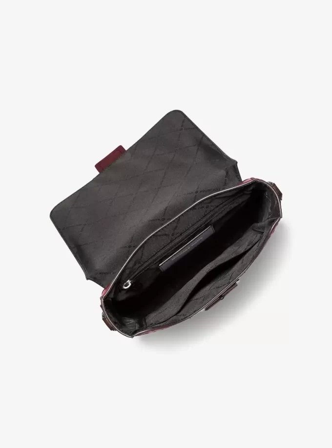 Colby-Umhängetasche aus geprägtem, poliertem Leder