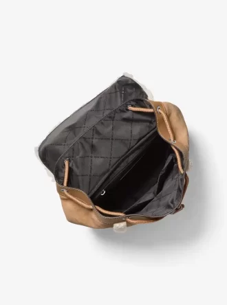 Cooper Wildleder- und Sherpa-Rucksack Cooper Wildleder- und Sherpa-Rucksack