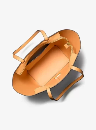 Flora Große Tragetasche aus Leder mit charakteristischem Logo