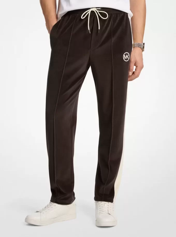 Gestreifte Velours-Jogginghose Gestreifte Velours-Jogginghose