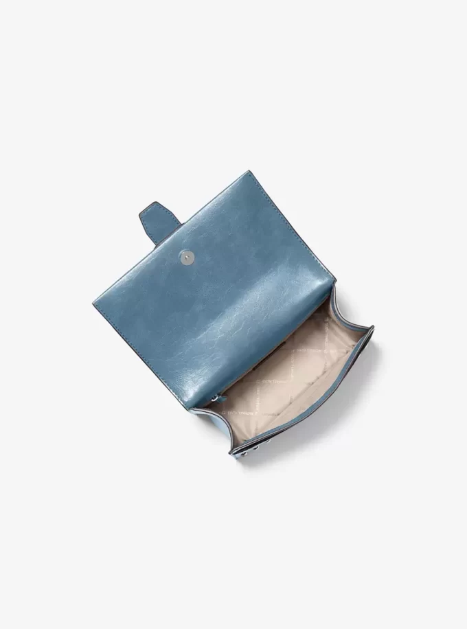 Greenwich Kleine, mit Nieten besetzte Umhängetasche im Used-Look Greenwich Kleine, mit Nieten besetzte Umhängetasche im Used-Look