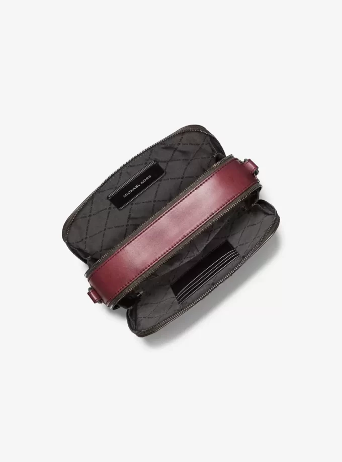 Hudson Logo geprägte, polierte Leder-Umhängetasche