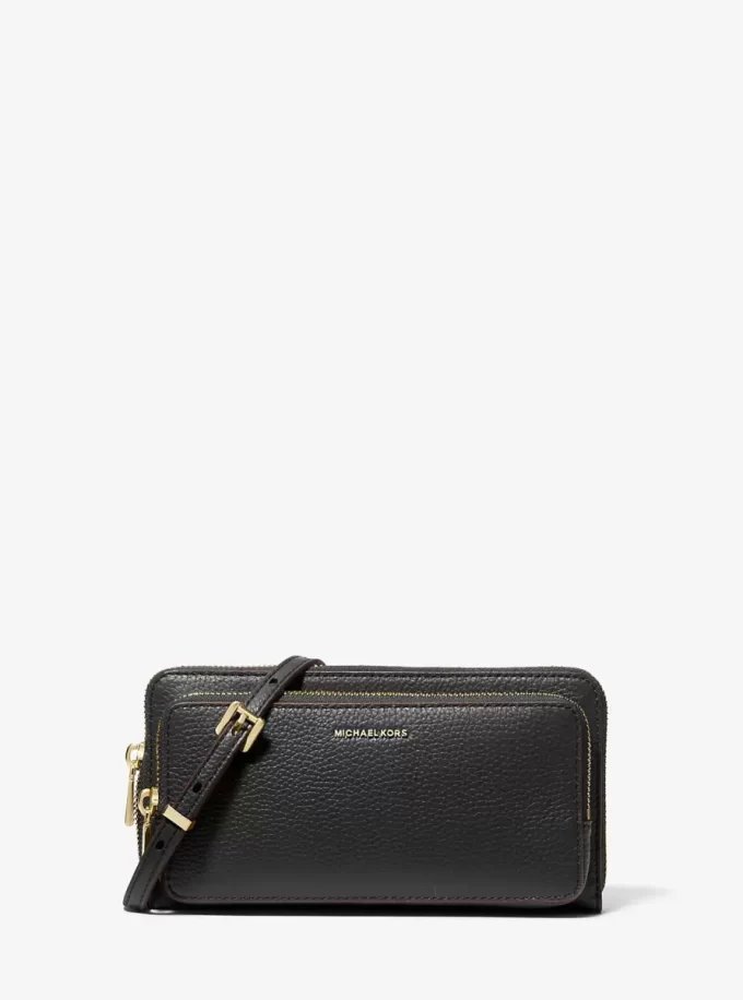 Jet Set Große, wandelbare Crossbody-Tasche aus genarbtem Leder Jet Set Große, wandelbare Crossbody-Tasche aus genarbtem Leder