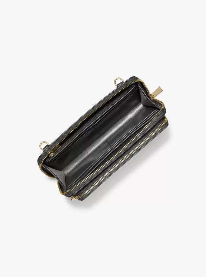 Jet Set Große, wandelbare Crossbody-Tasche aus genarbtem Leder Jet Set Große, wandelbare Crossbody-Tasche aus genarbtem Leder