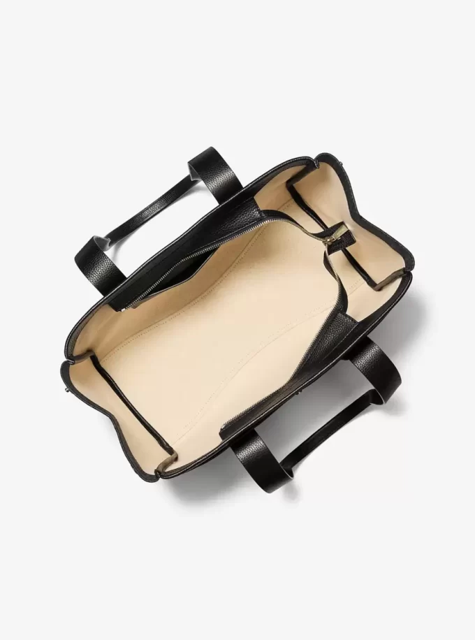 Romee Große Tragetasche aus Leder mit charakteristischem Logo Romee Große Tragetasche aus Leder mit charakteristischem Logo