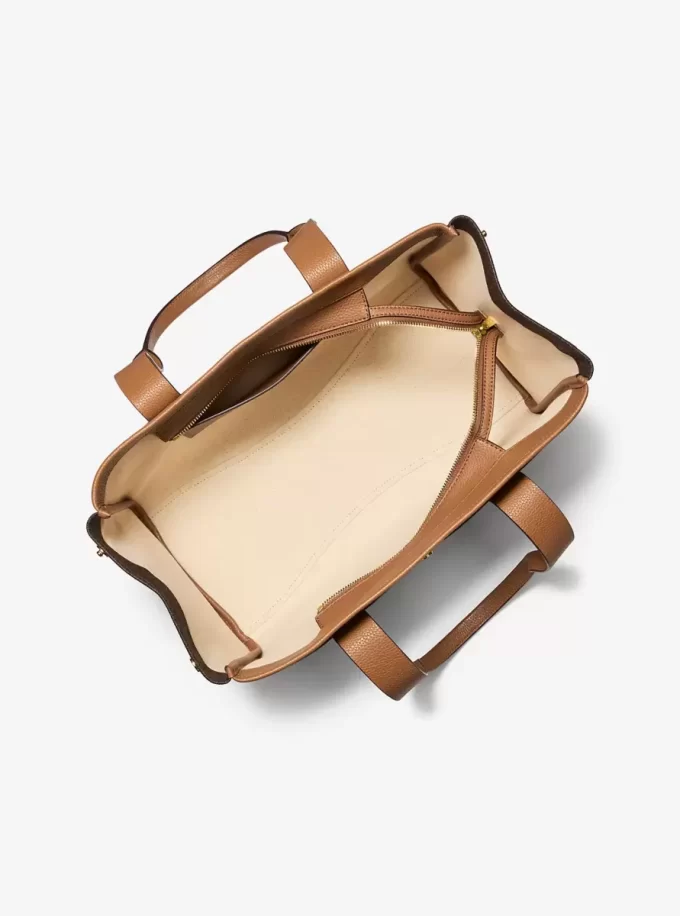 Romee Große Tragetasche aus Leder mit charakteristischem Logo