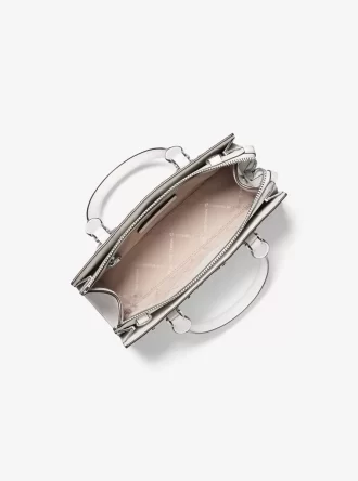 Sheila Small Schultertasche mit Nieten, Patchworkmuster und Logo