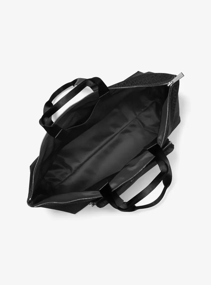 Tanner Große, bedruckte, wendbare und faltbare Tragetasche mit Logo