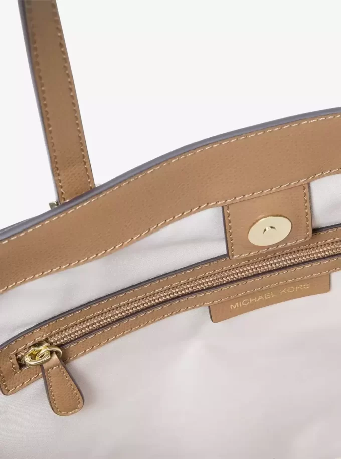 Taryn Große Tragetasche aus Leder mit charakteristischem Logo Taryn Große Tragetasche aus Leder mit charakteristischem Logo