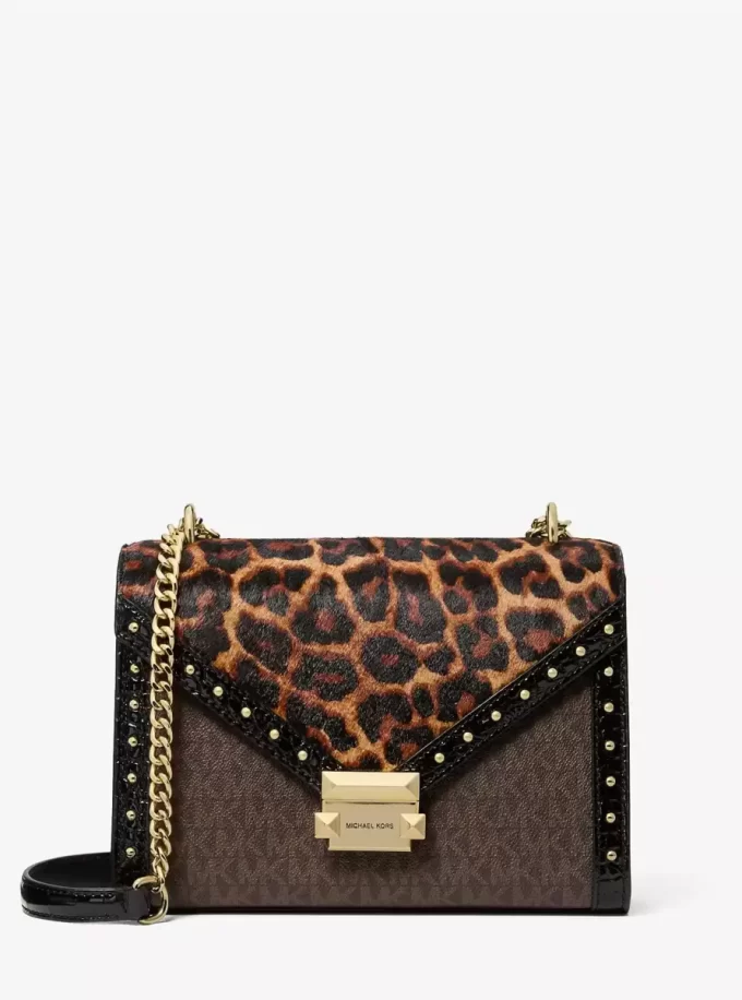 Whitney Schultertasche aus Kalbsfell mit Leopardenmuster und charakteristischem Logo